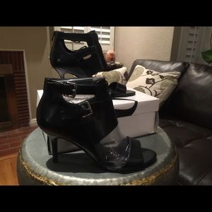 Never worn Nine West high heeled sandals.